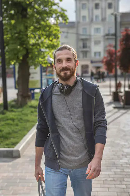 files/front-view-man-with-headphones-city_23-2148573065.webp